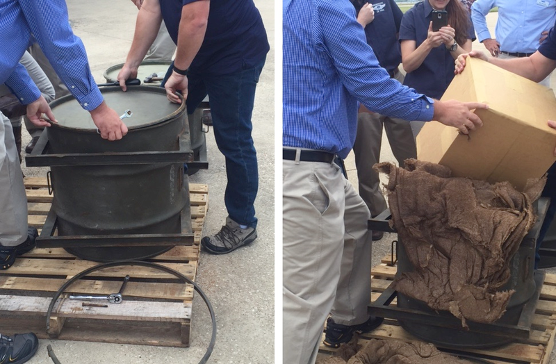 The bombsights being pulled out of the time capsules (Commemorative Air Force)